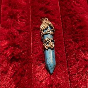 Turquoise Pendant with Floral Design